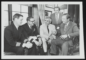 Navy officials meet with Senators Howard Cannon and Paul Laxalt to discuss the employment and the management status of Hawthorn Naval Ammunitions Depot: photographic print