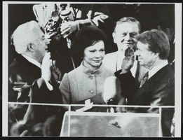 Chief Justice Warren Burger swears in Jimmy Carter as President at the 1977 inauguration with Howard Cannon and Rosalyn Carter attending: photographic print