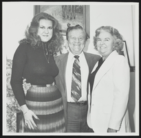 Howard Cannon with two unidentified women in his Washington, D.C. office: photographic print