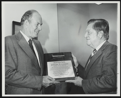 Howard Cannon receives a Golden Spike Award from former Amtrak President Alan Boyd: photographic print