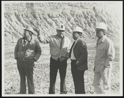 Howard Cannon at the Comstock Lode, Nevada with three unidentified men: photographic print