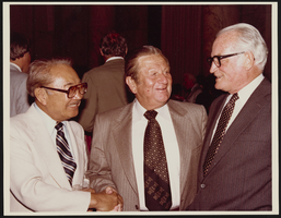 Howard Cannon attending reception with Senators S. I. Hayakawa and Barry Goldwater: photographic print