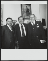 Howard Cannon, Glen Reese, and another man in his Washington, D.C. office: photographic print