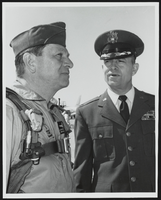 Howard Cannon, in flight gear, stands next to a United States Air Force officer at Nellis Air Force Base, North Las Vegas, Nevada: photographic print