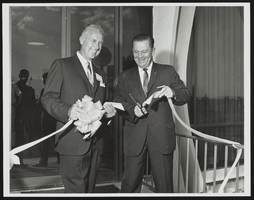E. Parry Thomas and Howard Cannon cut ribbon at a ceremony: photographic print