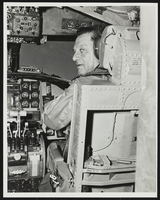Howard Cannon in the cockpit of an aircraft: photographic print