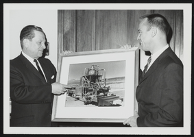 Howard Cannon and Commander Alan Shepard discussing Nevada's nuclear rocket engine program during a meeting in Cannon's Washington, D.C. office: photographic print