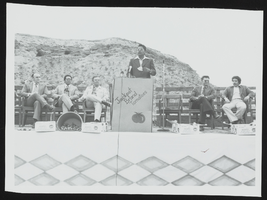 Howard Cannon during a visit to the Moapa Indian Reservation with Lieutenant Myron Leavitt, Lamond Godwin, tribal chairman Preston Tom, Keith Axtell, and tribal instructor Harold Goldsmith: photographic print