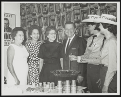 Howard and Dorothy Cannon with campaign workers and Lucille May: photographic print