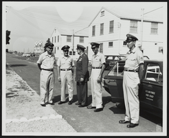 Howard Cannon speaking with United States Air Force personnel: photographic print