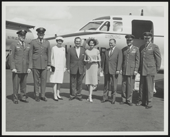 Howard Cannon posed with people and United States Air Force personnel in front of a T-39 aircraft at Kingsley Field, Klamath Falls, Oregon: photographic print