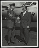 Howard Cannon shaking hands with United States Air Force personnel: photographic print