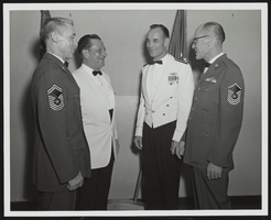 Howard Cannon speaking with United States Air Force personnel: photographic print