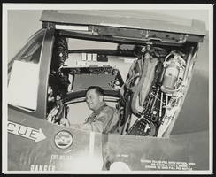 Howard Cannon in an aircraft cockpit: photographic print