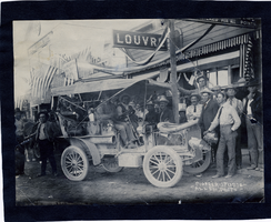 Unidentified group pose around an automobile, image 001: photographic print