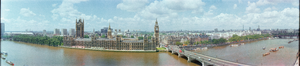 View of Big Ben and House of Commons from across the Thames, London, England: panoramic photograph