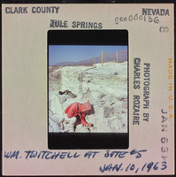Photographic slide of William Twitchell at Tule Springs, Nevada. January 10, 1963