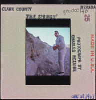Photographic slide of a man at Tule Springs, Nevada, January 28, 1963
