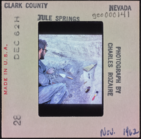 Photographic slide of a man at Tule Springs, Nevada, November 1962
