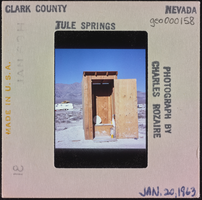 Photographic slide of an outhouse, Tule Springs, Nevada, January 20, 1963