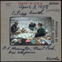Photographic slide of people eating lunch at Tule Springs, Nevada, April 3, 1956