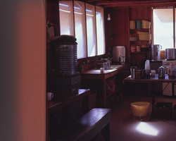 Photograph of camp site kitchen, circa 1962-1963