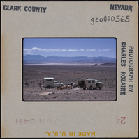 Photographic slide of trucks near Pintwater Cave, Nevada, circa 1964