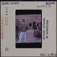 Photographic slide of men at Tule Springs, Nevada, December 3, 1962