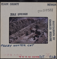 Photographic slide of men in a trench at Tule Springs, Nevada, October 1962