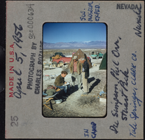 Photographic slide of Dee Simpson, Phil Orr, and Stuart Pick, Tule Springs, Nevada, April 5, 1956