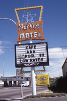 Starview Motel, Boulder City flag mounted pylon and marquee sign, Nevada: photographic print