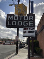 7/11 Motor Lodge flag mounted sign, Reno, Nevada: photographic print