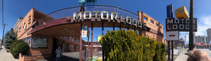 7/11 Motor Lodge flag mounted marquee and banner signs, Reno, Nevada: photographic print