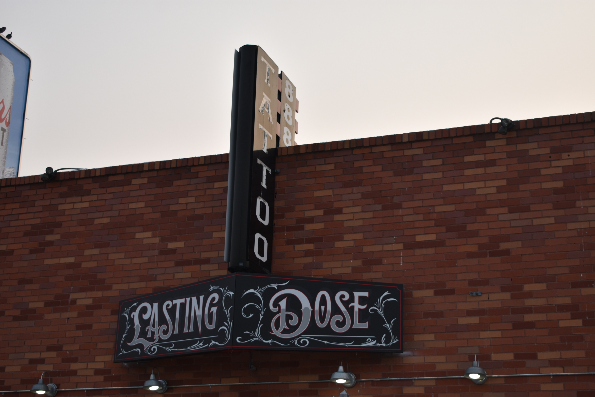 Lasting Dose Tattoo wall mounted signs, Reno, Nevada