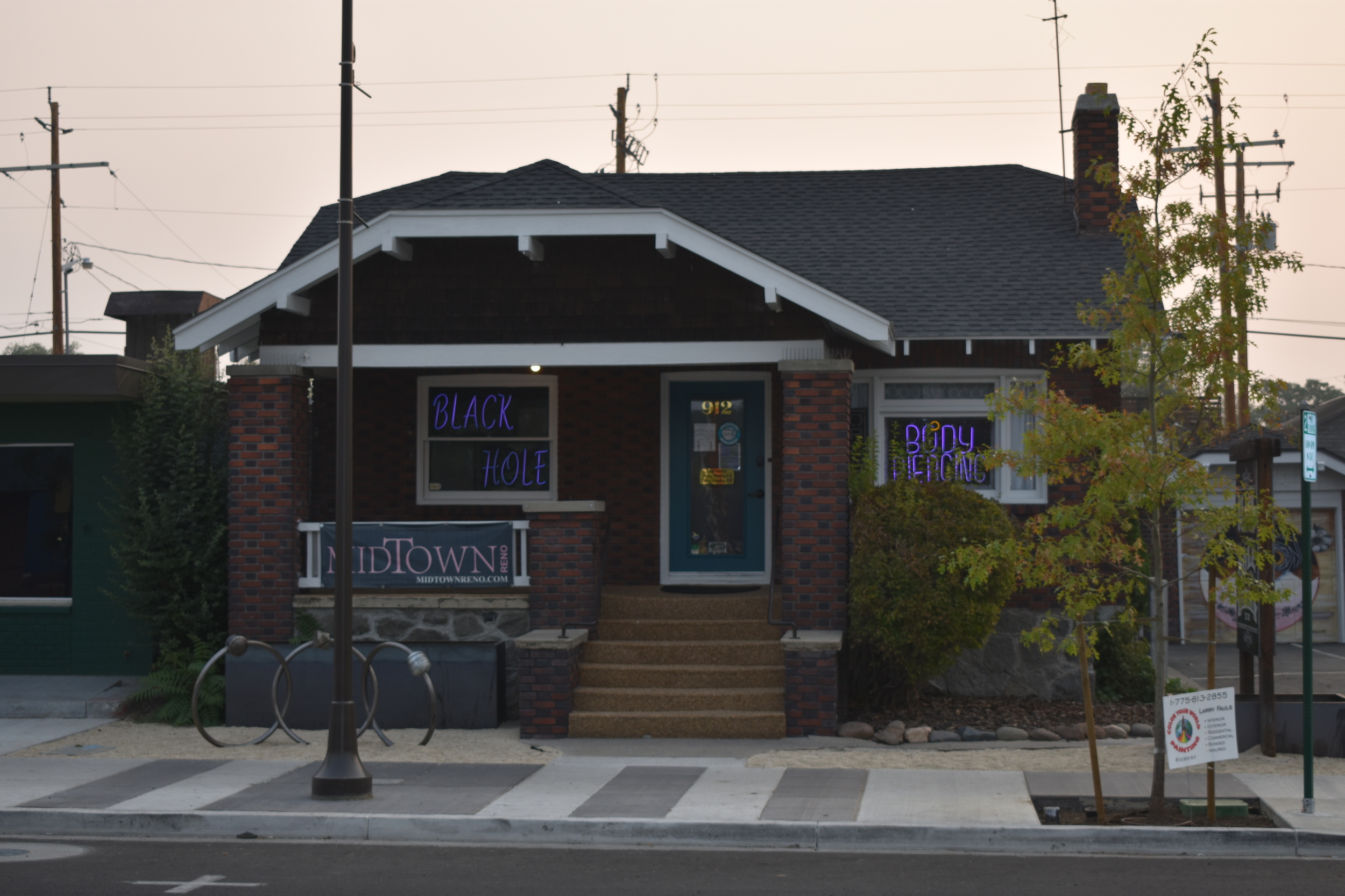Black Hole Body Piercing window signs, Reno, Nevada