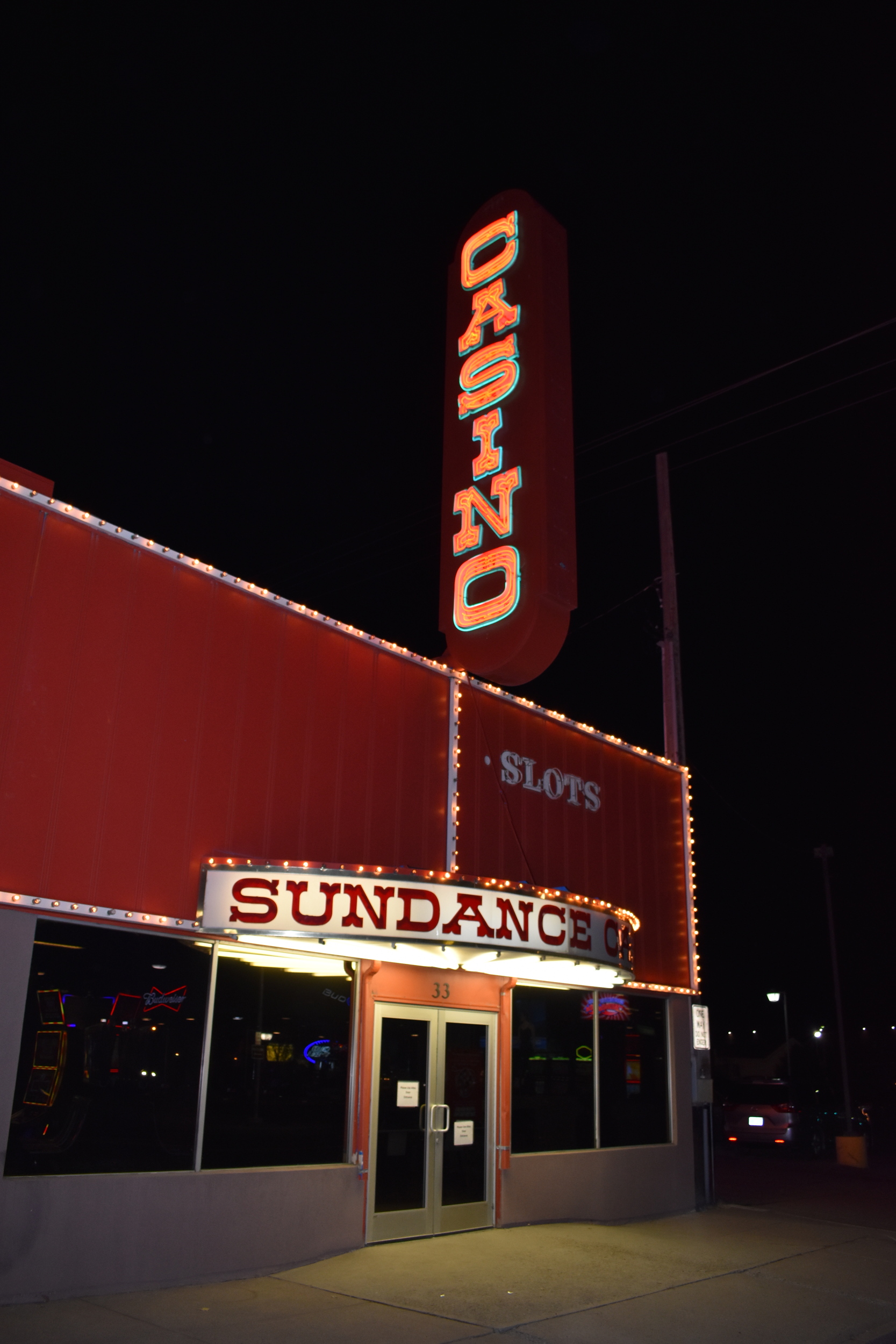 Sundance Casino flag mounted and marquee signs, Winnemucca, Nevada