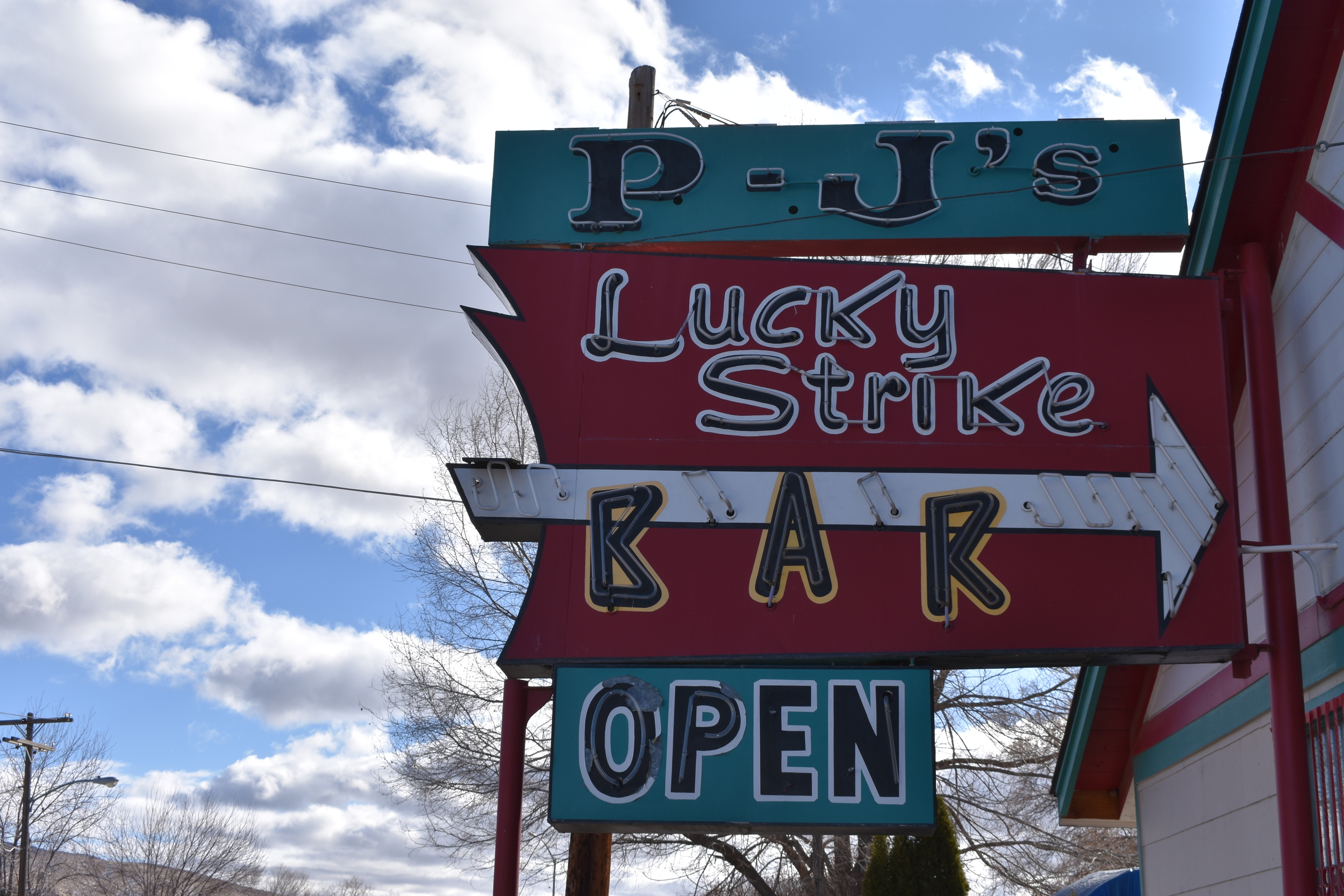PJ's Lucky Strike Bar flag mounted sign, Elko, Nevada