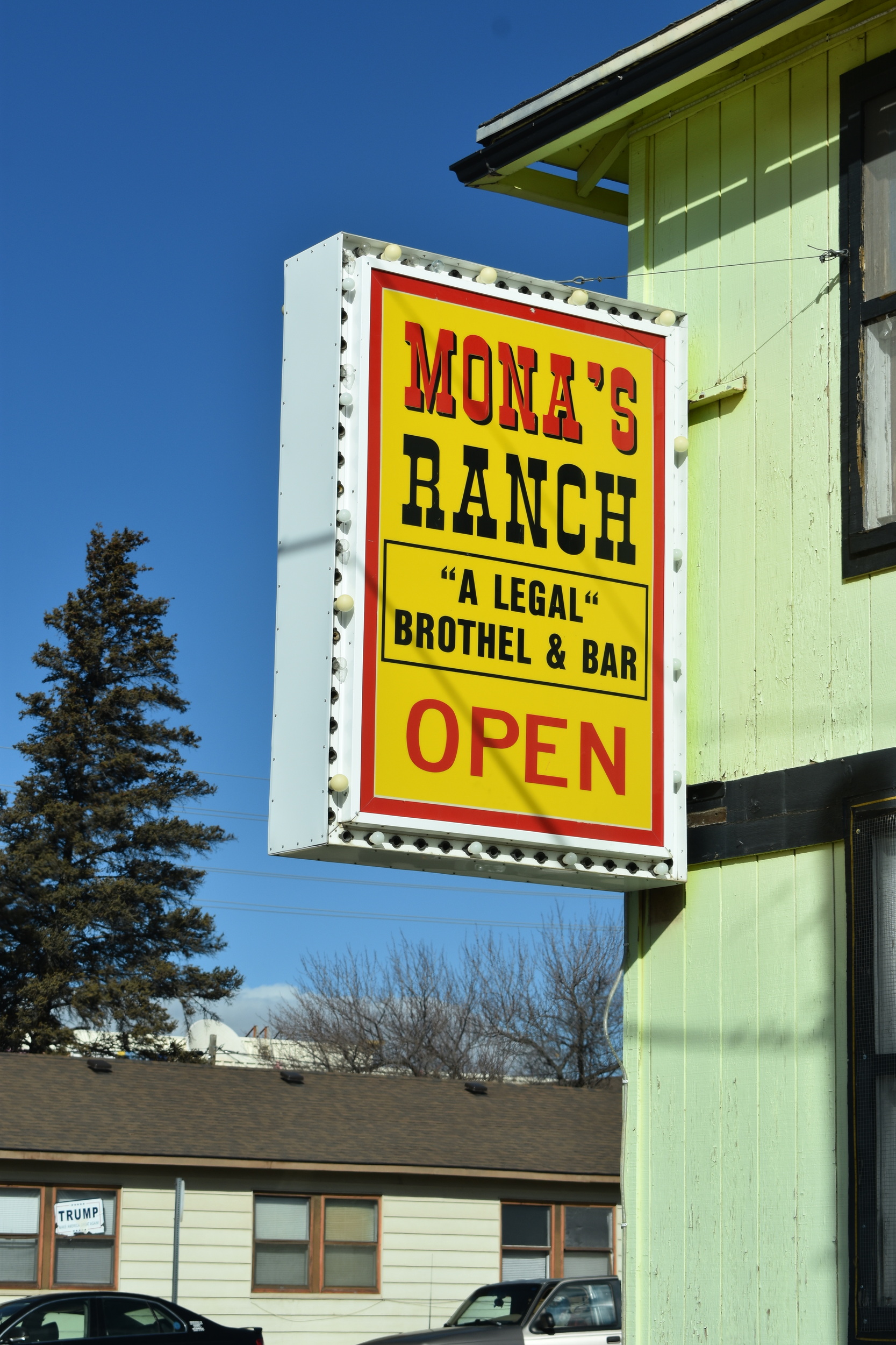 Mona's Ranch flag mounted wall sign, Elko, Nevada