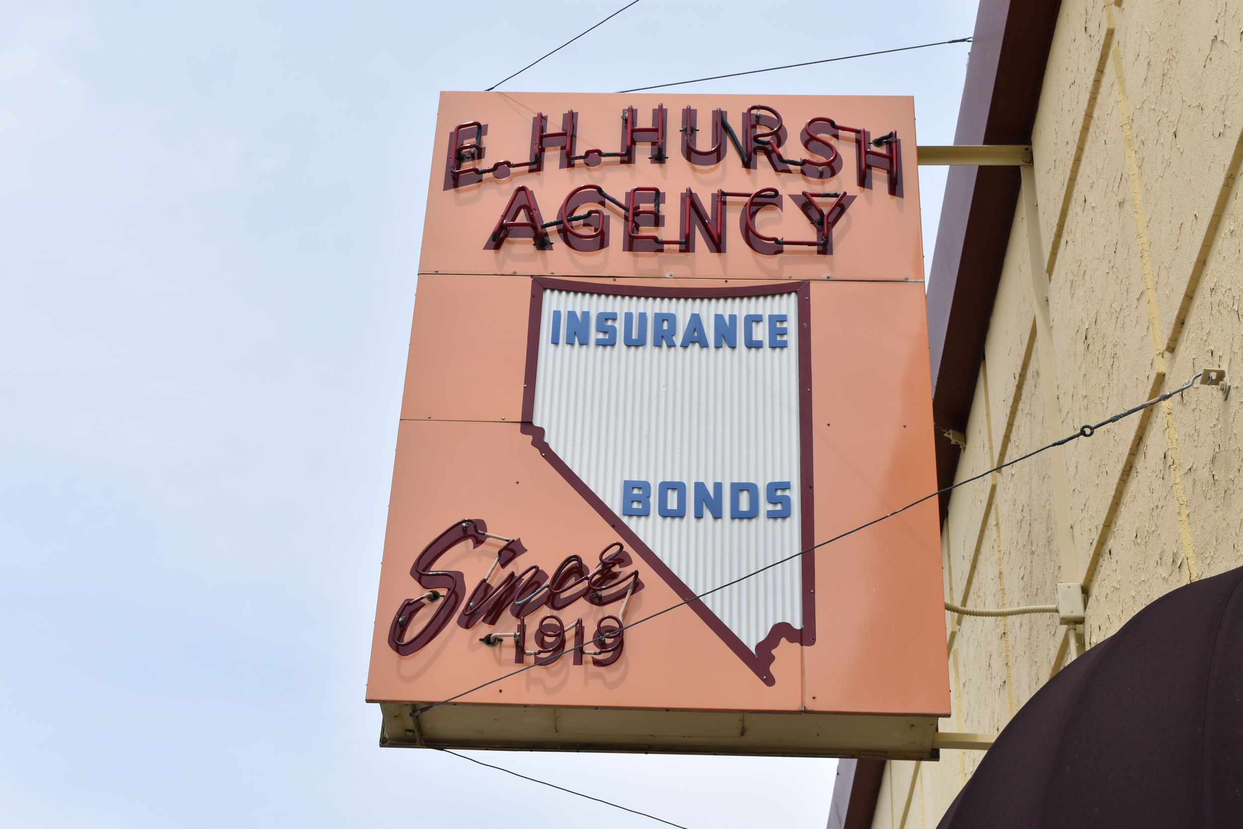 E.H. Hursh Inc. flag mounted wall sign, Fallon, Nevada