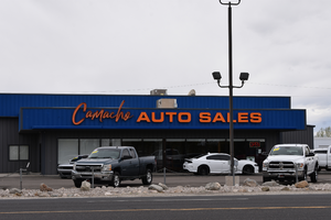 Camacho Auto Sales wall mounted sign