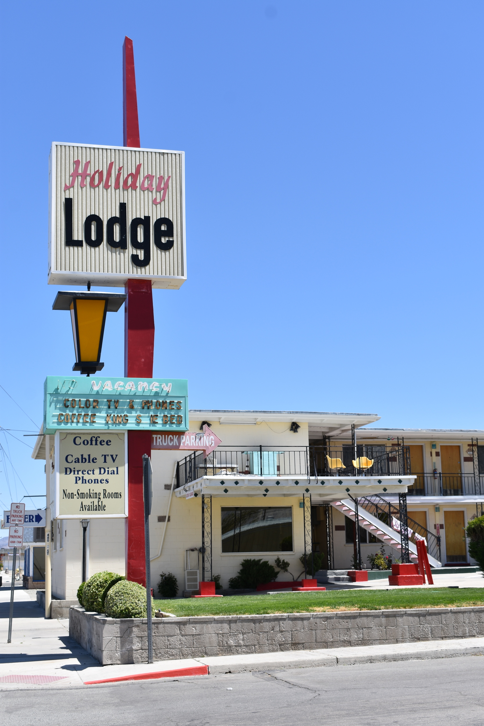 Holiday lodge flag mounted signs, Hawthorne, Nevada