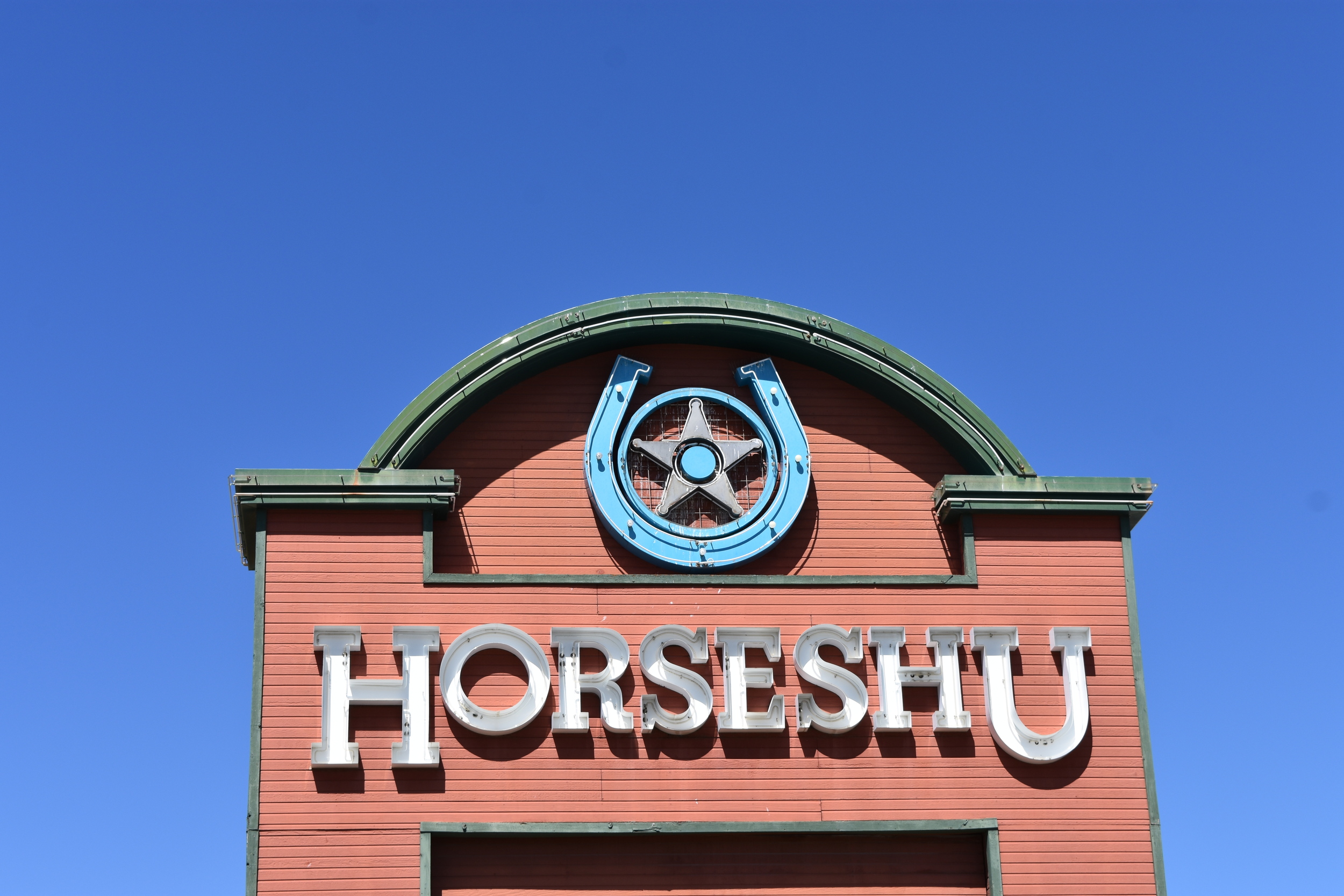 Horseshu Hotel & Casino double mounted sign, Jackpot, Nevada