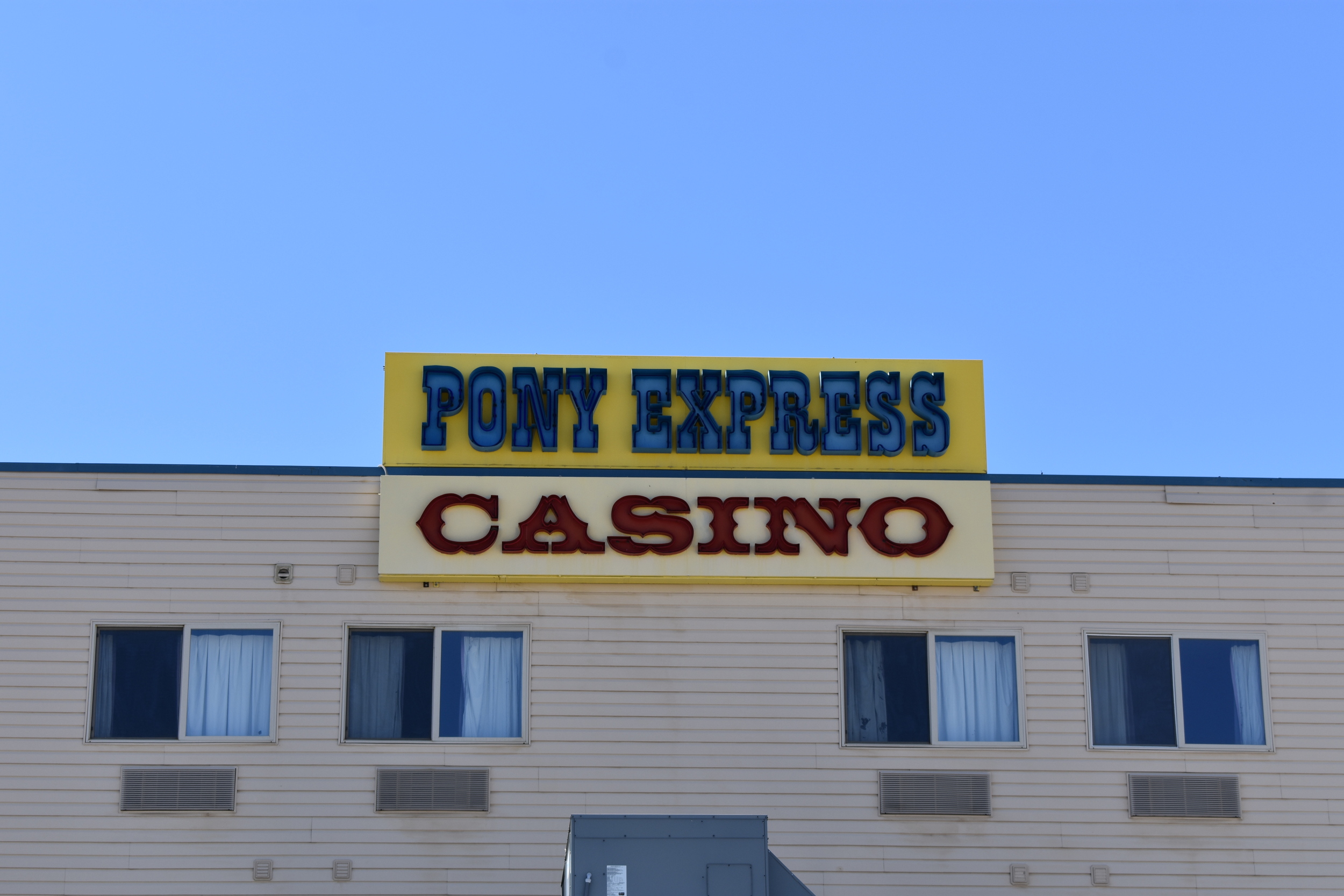 Pony Express Casino wall mounted signs, Jackpot, Nevada