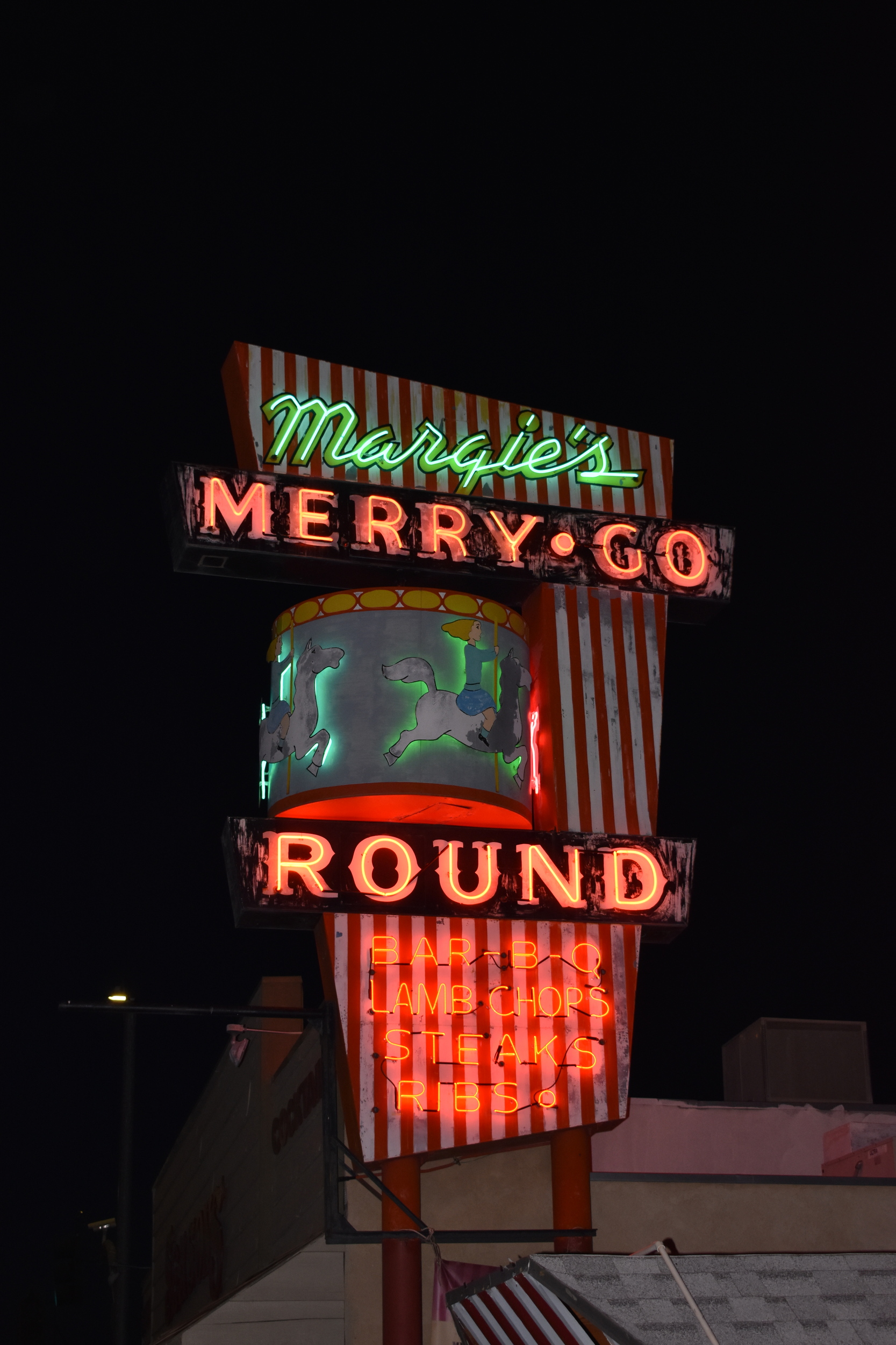 Merry Go Round double mounted sign, Lone Pine, California