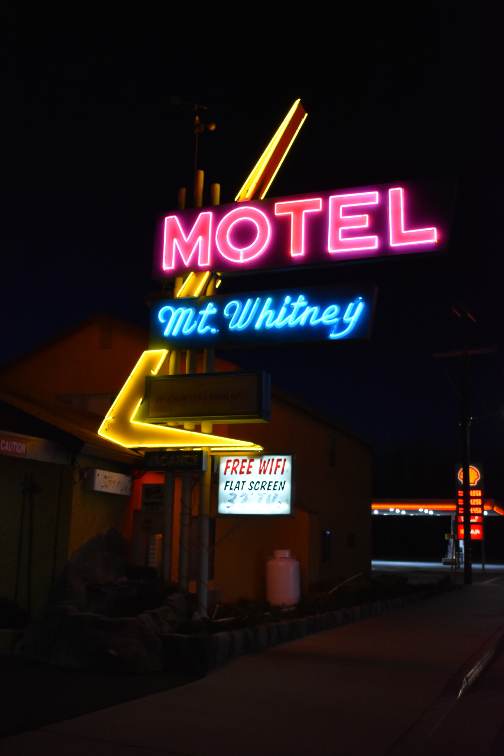 Mt. Whitney Motel flag mounted sign, Lone Pine, California