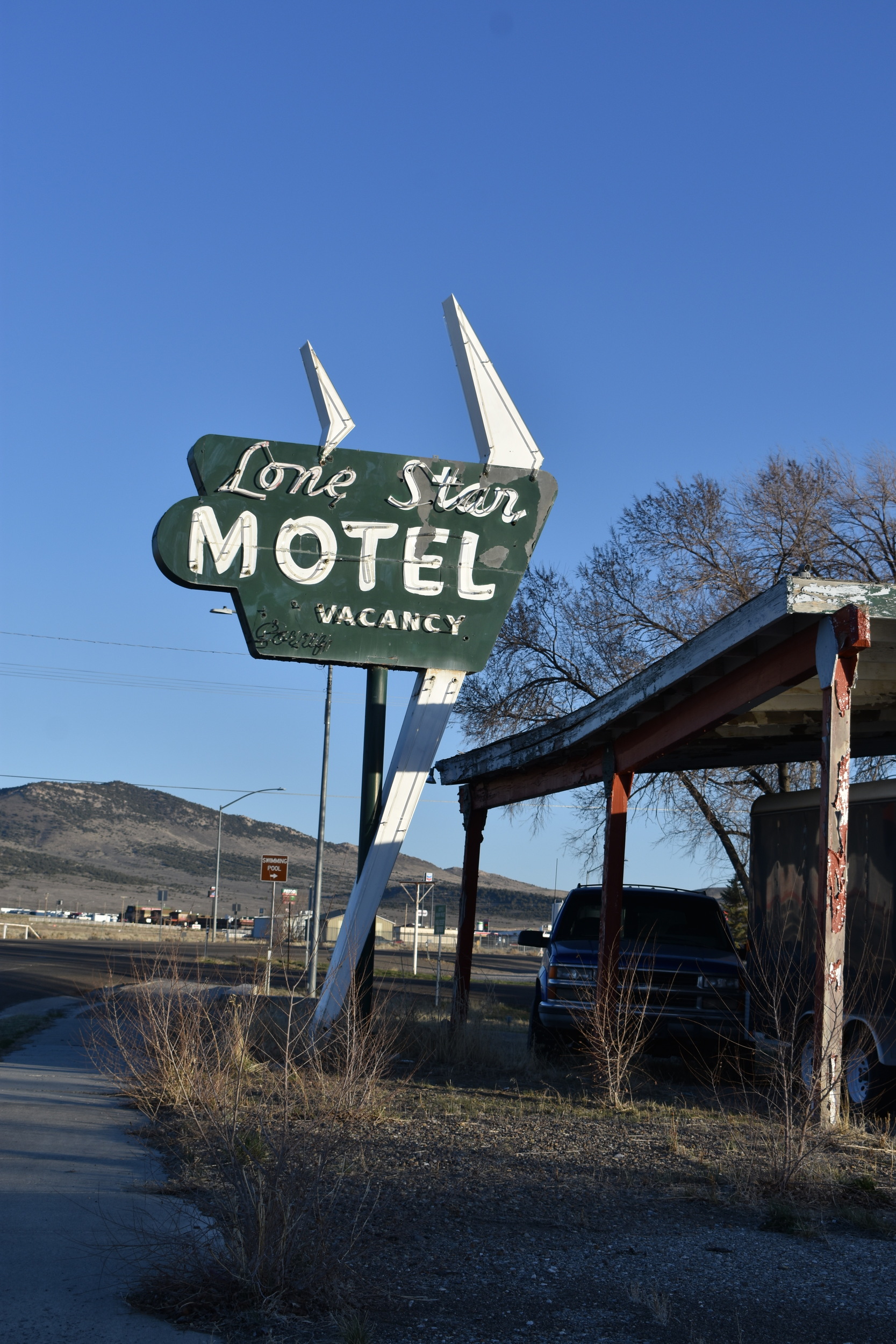 Lone Star Motel flag mounted sign, Wells, Nevada