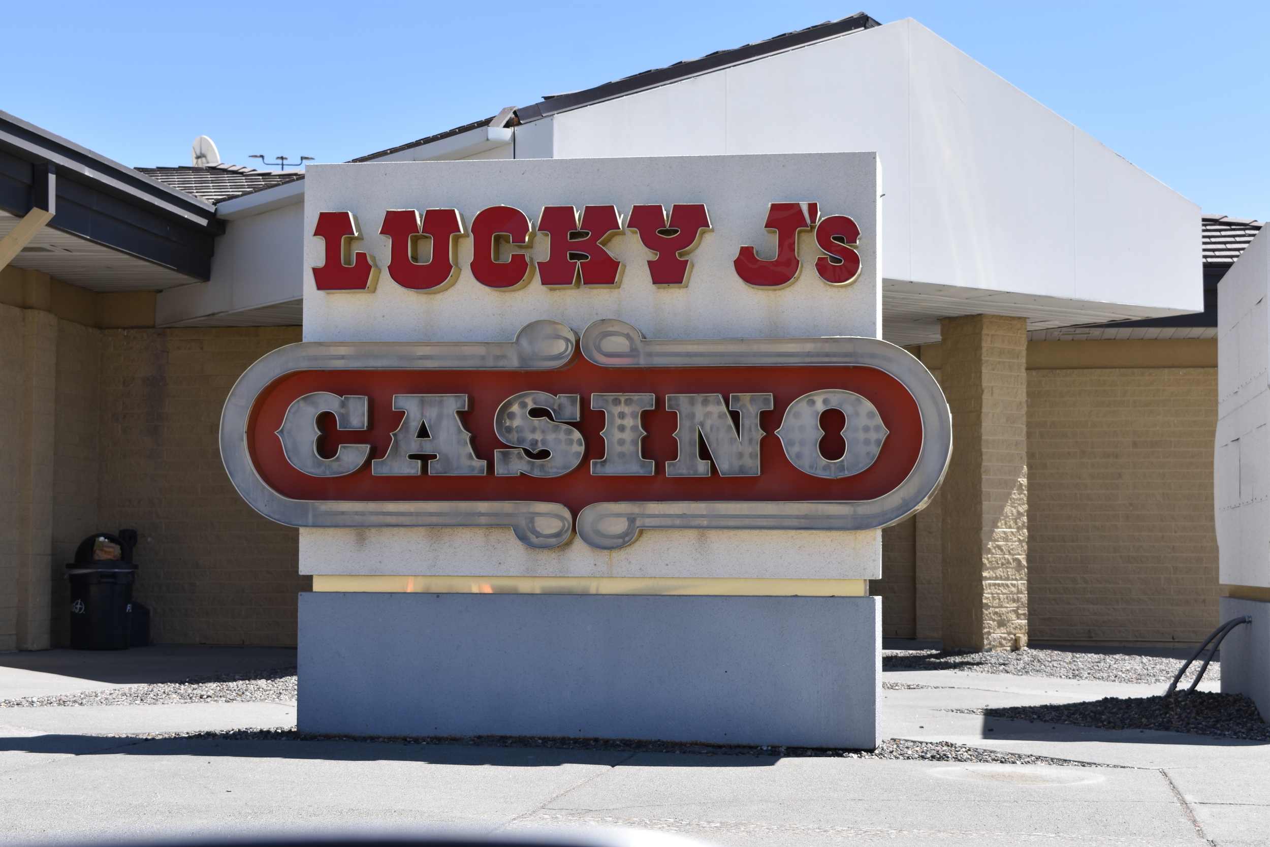 Lucky J's Casino mounted sign, Wells, Nevada