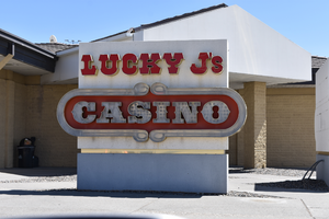 Lucky J's Casino mounted sign, Wells, Nevada