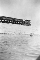 Narrow gauge ore train on the standard gauge tracks of the T&T Railroad, Nevada: photographic print