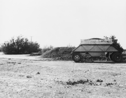 Trailer holds alfalfa pellets: photographic print